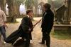 alfonso_cuaron_on_hogwarts_courtyard_set_talking_to_daniel_radcliffe_t1.jpg